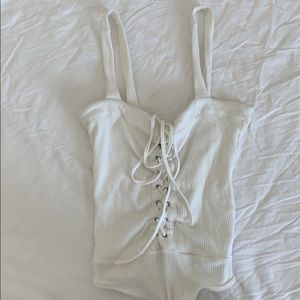 White lace up body suit